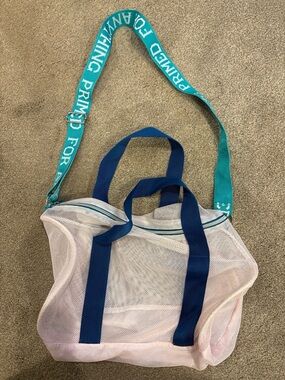 Mesh Travel Tote with Turquoise Branded Strap and Navy Handles